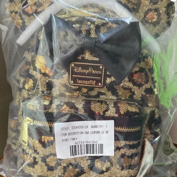 LOUNGEFLY Handbags - LOINGEFLY DISNEY PARKS MINNIE CHEETAH PRINT SEQUENCED  BACKPACK RARE NWT